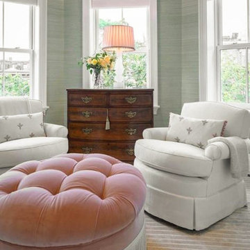 Experience luxury and glamour with this pink velour fringe ottoman