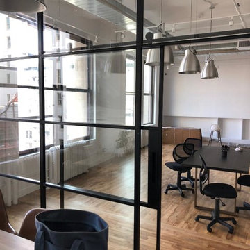 Steel &Glass Office Space with Suspended Door