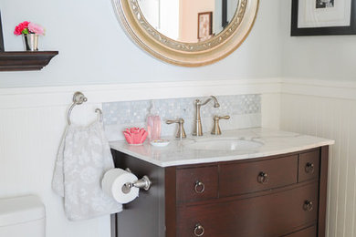 Small elegant 3/4 gray tile and subway tile marble floor walk-in shower photo in Vancouver with furniture-like cabinets, dark wood cabinets, a one-piece toilet, gray walls, an undermount sink and marble countertops