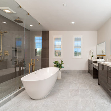 Elegant master bathroom with large format tile