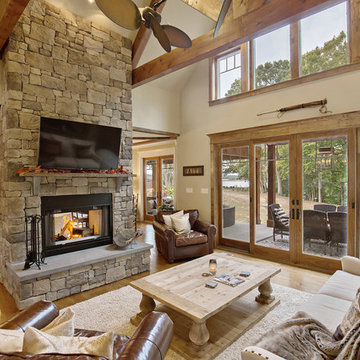 French country, lodge-style riverfront home