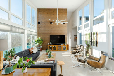 This is an example of a contemporary family room in Austin.