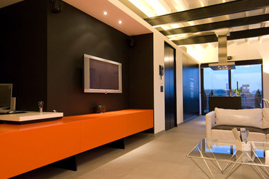 Inspiration for a contemporary living room remodel in Other with black walls