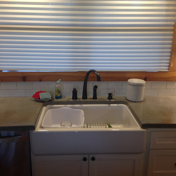 Log Cabin Grey Concrete Countertops White Cabinets