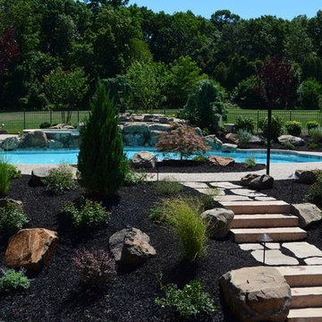 Custom Pools & Spas, Outdoor Kitchens, Patios & Walkways, and Plantings
