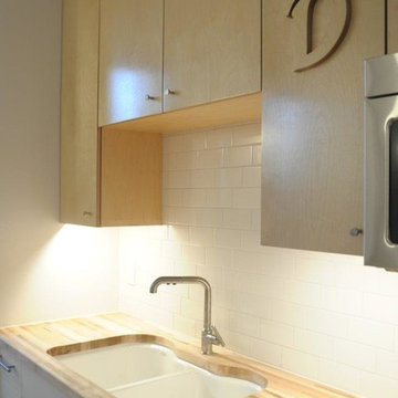 Cuustom, built-in, two tone kitchen cabinetry.