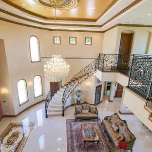 This is an example of a large mediterranean formal open plan living room in San Francisco with white walls, lino flooring, no fireplace and no tv.