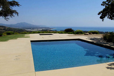 Inspiration for a mid-sized contemporary concrete and rectangular pool fountain remodel in San Luis Obispo