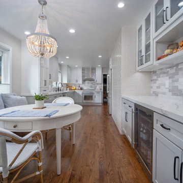 Upper glass front cabinets and lower built-in cabinets from Crystal Cabinet Work