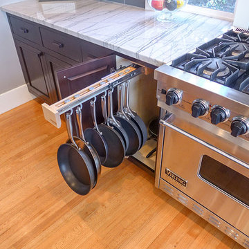 Cabinets hide pan storage with easy access