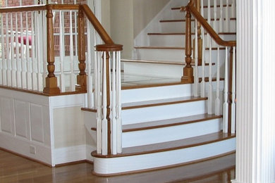 Example of a painted l-shaped staircase design in Other