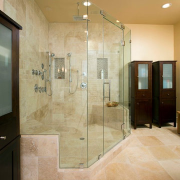 Use of Glass, Light and Fixtures Sets Leesburg Master Bathroom Apart