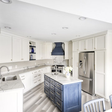 Navy Stained Island, Hood vent and Floating Shelves in White Shaker Kitchen