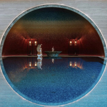 Circular Spa Pool Travertine Arch View