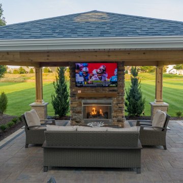 Medina Structure, Fireplace, Unilock Patio and Landscaping