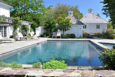 Elegant rectangular pool photo in Chicago