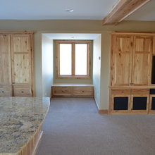 granite for hickory cabinets