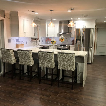 Contemporary Latte (White) Kitchen Remodel with waterfall counter top edge