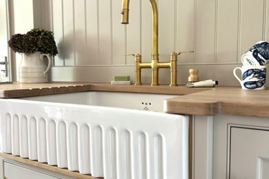 Inspiration for a beach style utility room in Essex.