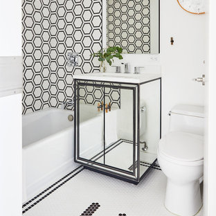 Bathroom - contemporary black and white tile mosaic tile floor and white floor bathroom idea in New York with flat-panel cabinets, white walls, an undermount sink and white countertops