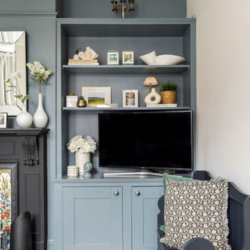 Calm & serene living room with a mix of chrome & brass metal accents