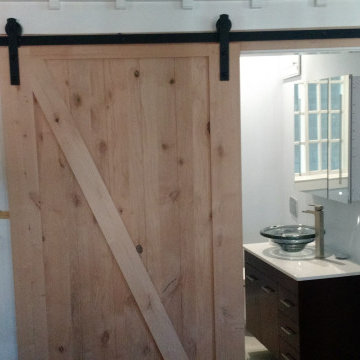 Master Bathroom Remodel with Marble Tile, Pebble Floor & Barn Door — Alameda, CA