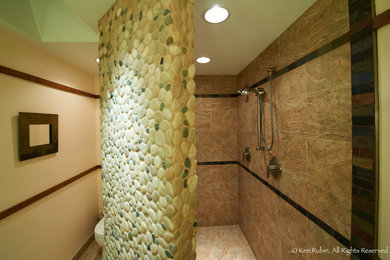 Alcove shower - large contemporary master pebble tile ceramic tile alcove shower idea in DC Metro with shaker cabinets, medium tone wood cabinets, a two-piece toilet, beige walls, an undermount sink and granite countertops