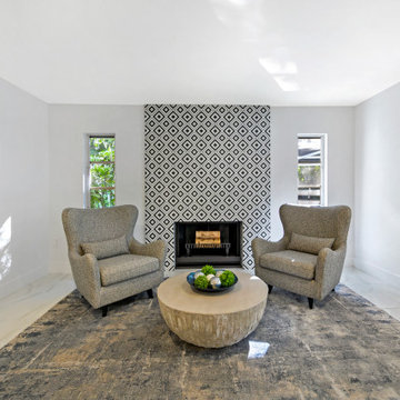 Mid-Century Sitting Area With Feature Fireplace — Siesta Key Staging