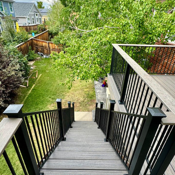 Custom Trex composite deck installed by Global Cooperation LLC in Aurora, Co.