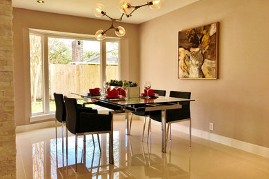 Dining room - contemporary dining room idea in Houston