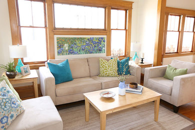 Inspiration for a small craftsman enclosed medium tone wood floor and multicolored floor living room remodel in Other with white walls, a concealed tv and no fireplace