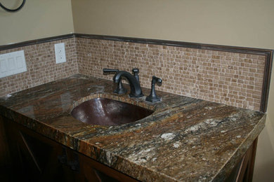 Inspiration for a mid-sized 3/4 beige tile and stone tile bathroom remodel in Salt Lake City with a drop-in sink and beige walls