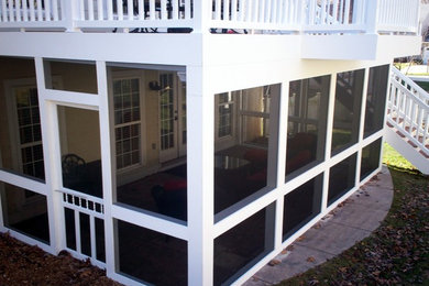 Elegant backyard deck photo in St Louis