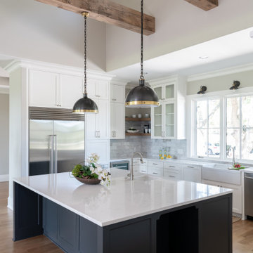 Kitchen view into light well with transom windows