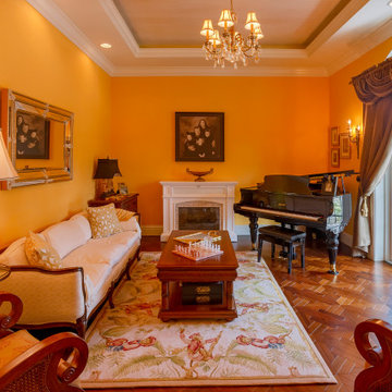 Classic Grand Piano Room with Regal Charm and Vintage Accents