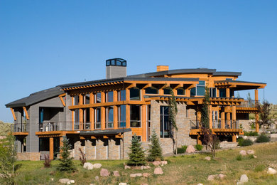 Inspiration for a huge contemporary gray three-story mixed siding house exterior remodel in Salt Lake City