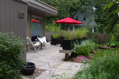 This is an example of a mid-century modern landscaping in Other.