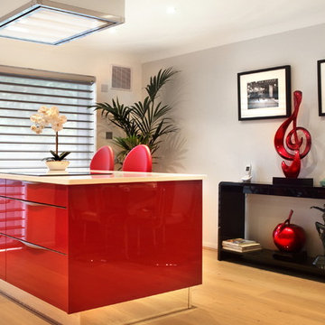 High gloss red kitchen with contemporary finishes