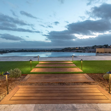 Gorgeous Infinity Pool with mulitple outdoor living spaces