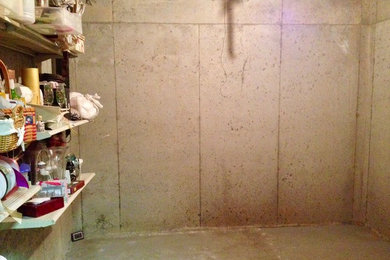 Wine cellar - industrial wine cellar idea in Atlanta