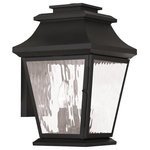 Livex Lighting - Hathaway Outdoor Wall Lantern, Black - This outdoor wall lantern light looks great near garage doors, entryways, and porches. Our handsome black finish is paired with clear water glass and durable solid brass construction for a classic look and feel that works with any home. Candelabra bulbs offer a warm, soft glow, so you can feel both safe and stylish.