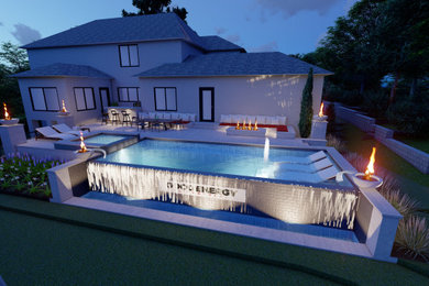 Example of a large trendy backyard concrete paver and custom-shaped infinity hot tub design in Atlanta