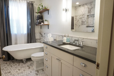 Mid-sized transitional bathroom in Portland with shaker cabinets, white cabinets, a claw-foot tub, an open shower, a two-piece toilet, ceramic tile, white walls, ceramic floors, an undermount sink, engineered quartz benchtops and an open shower.