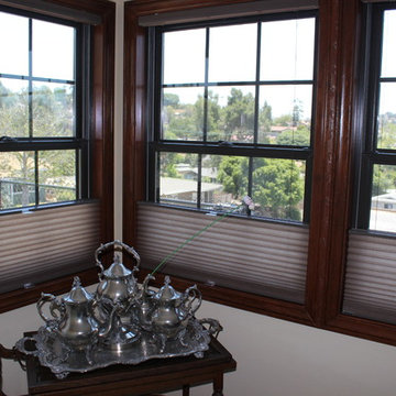 Elegant dining room with top down bottom up honeycomb shades