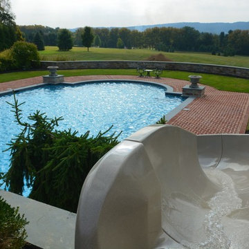 Infinity edge pool with underground grotto
