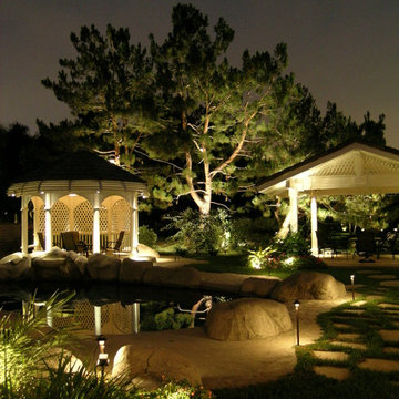 Artistic Night Lighting ~ Affordable Lawn Sprinklers and Lighting