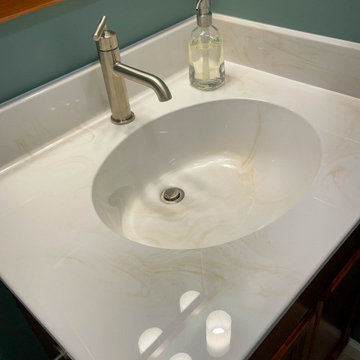 Basement Bathroom Remodel with Cultured Marble Shower