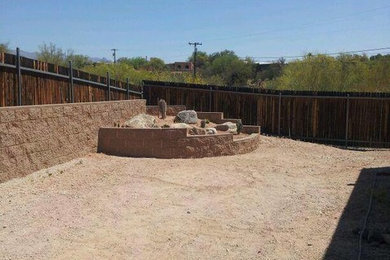 Inspiration for a rustic landscaping in Phoenix.