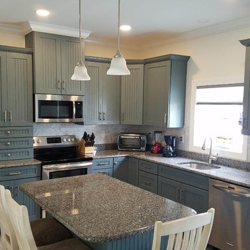 Medallion Cabinetry, Oak with Islander painted finish