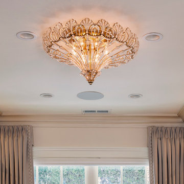 Custom Couture Master Closet with Cove Molding and Crystal Chandelier